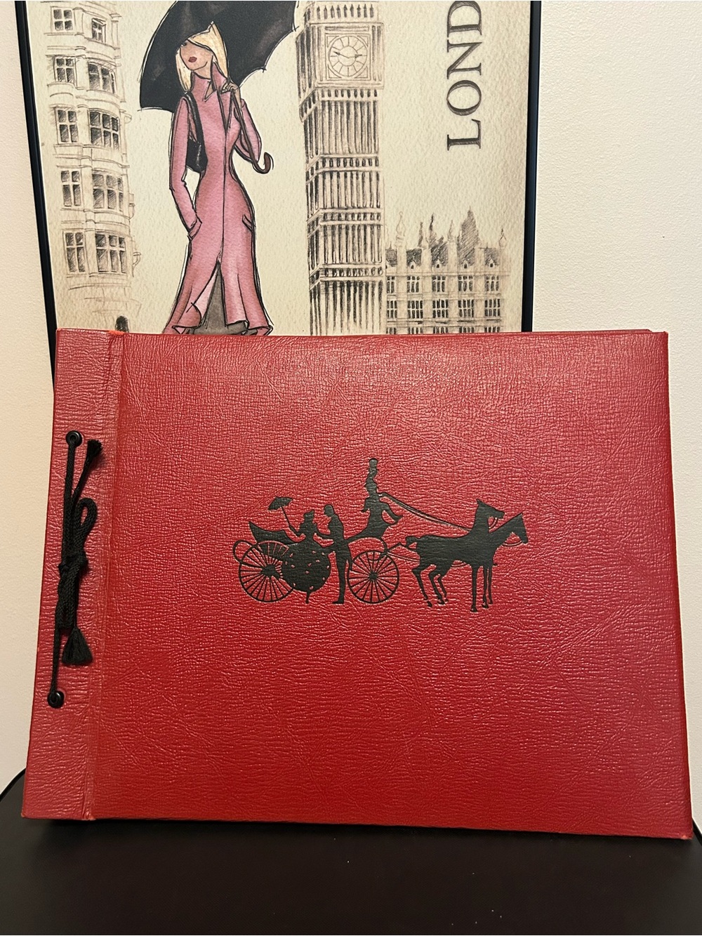 Vintage Red Photo Album with Horse-Drawn Carriage Motif